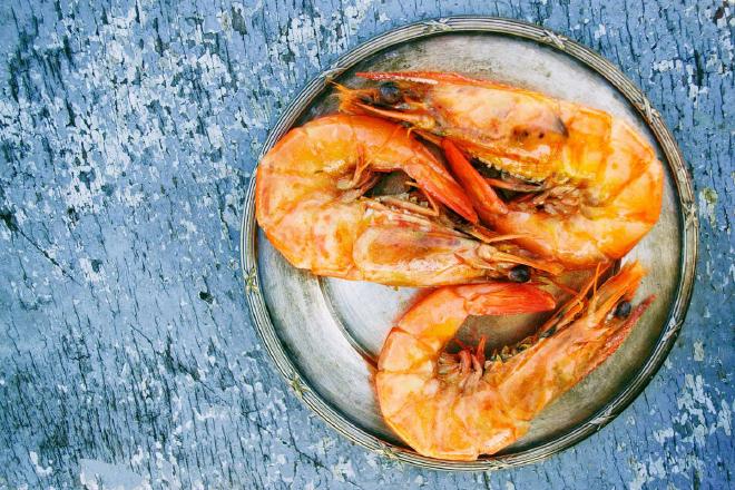three shrimp on a plate